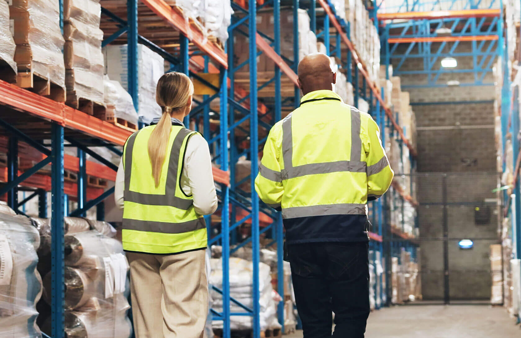 Warehouse workers walking
