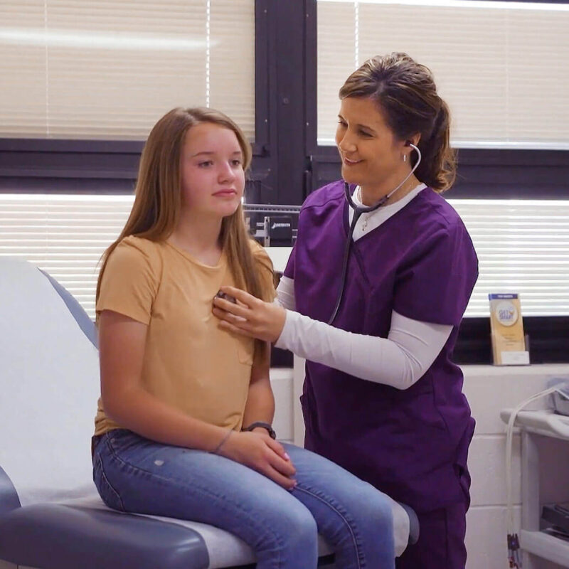 Junie Maynard C-FNP with Patient